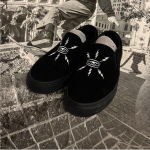 Black Slip-On Men Shoes skate shoes by war saw